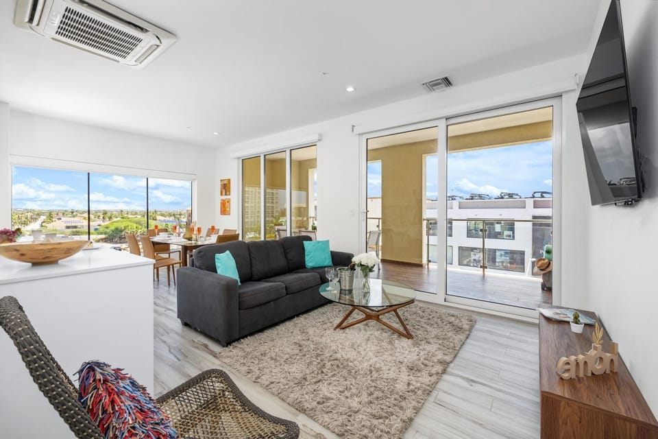 Modern Corner Unit  Pool  Steps from Palm Beach! (22806)