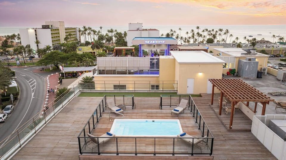 Modern Corner Unit  Pool  Steps from Palm Beach! (22132)