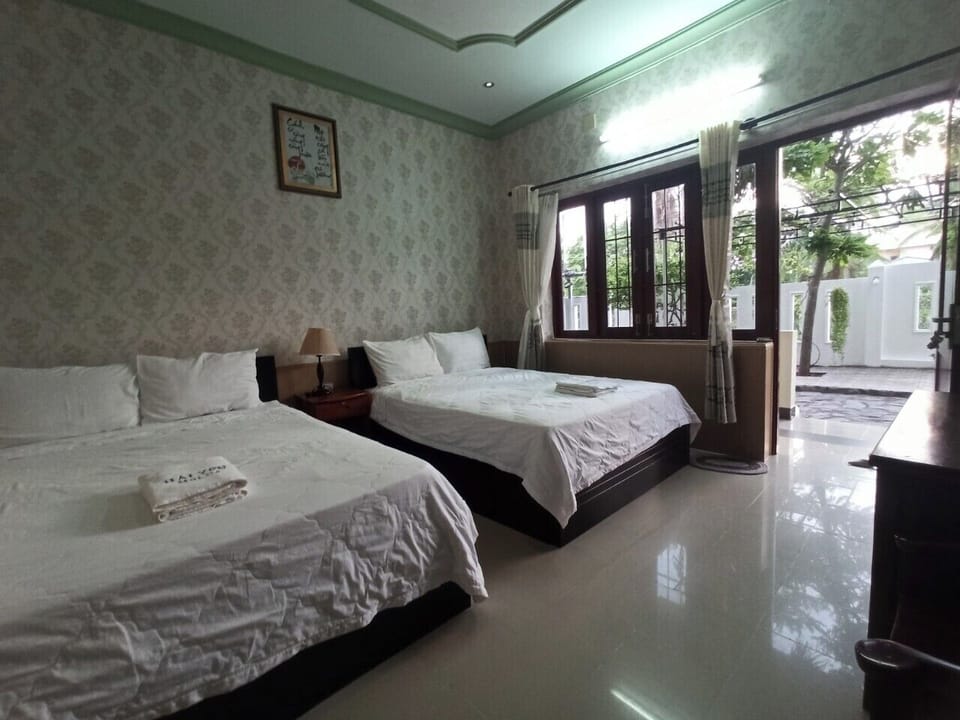Basic Quadruple Room, Garden View | Desk, free WiFi