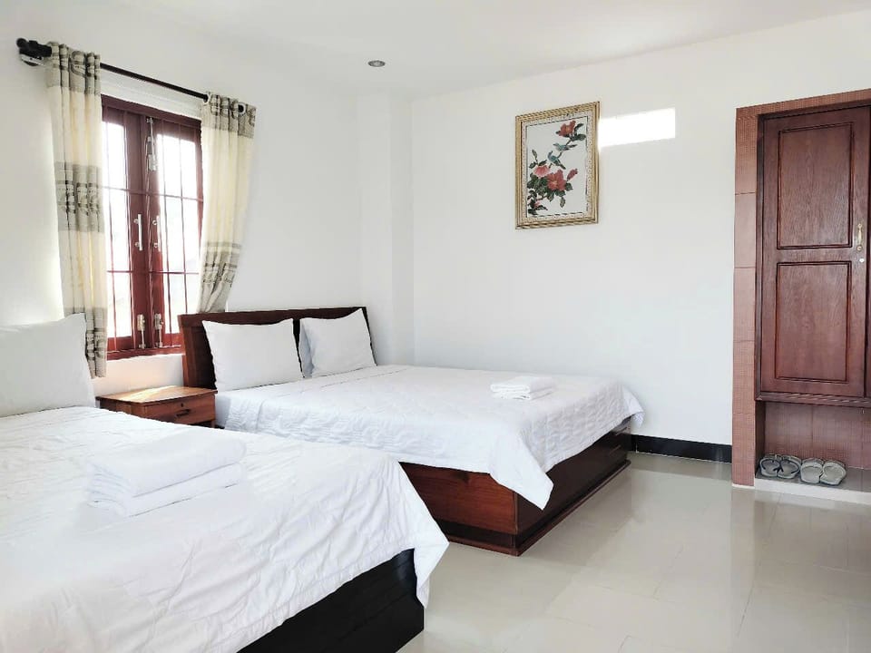 Basic Quadruple Room, Garden View | Desk, free WiFi