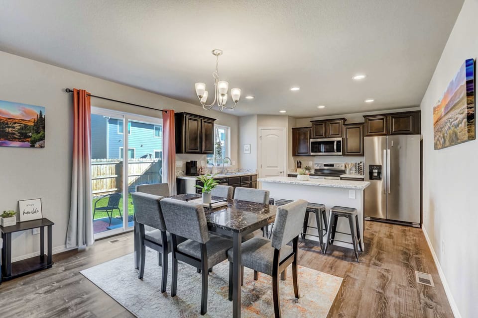 Enjoy meals together in this comfortable dining space and fully equipped kitchen.