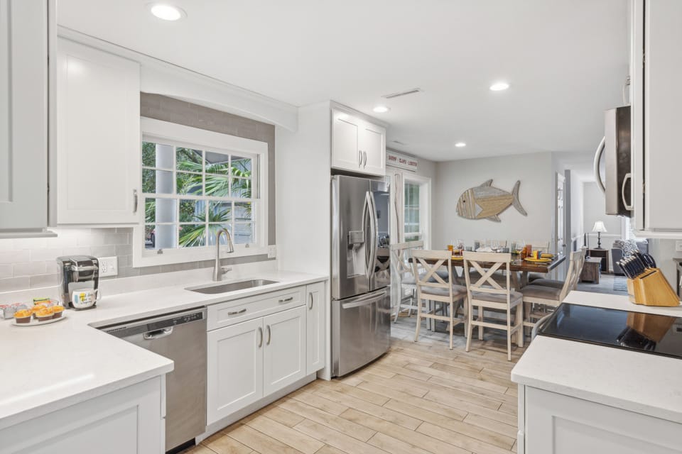 A fully-equipped kitchen awaits on the main level, simplifying meal preparation.