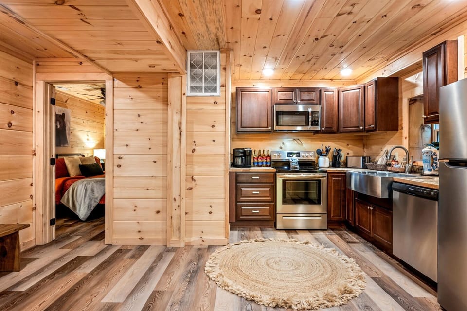 Enjoy the large open space where everyone can gather, access the kitchen, and help prepare delicious meals together.