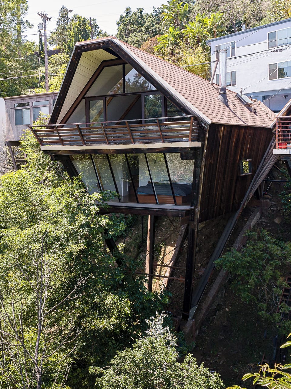 This is one of architect Harry Gesner's Iconic Boat Houses. He built 12 originally and only 10 remain.
