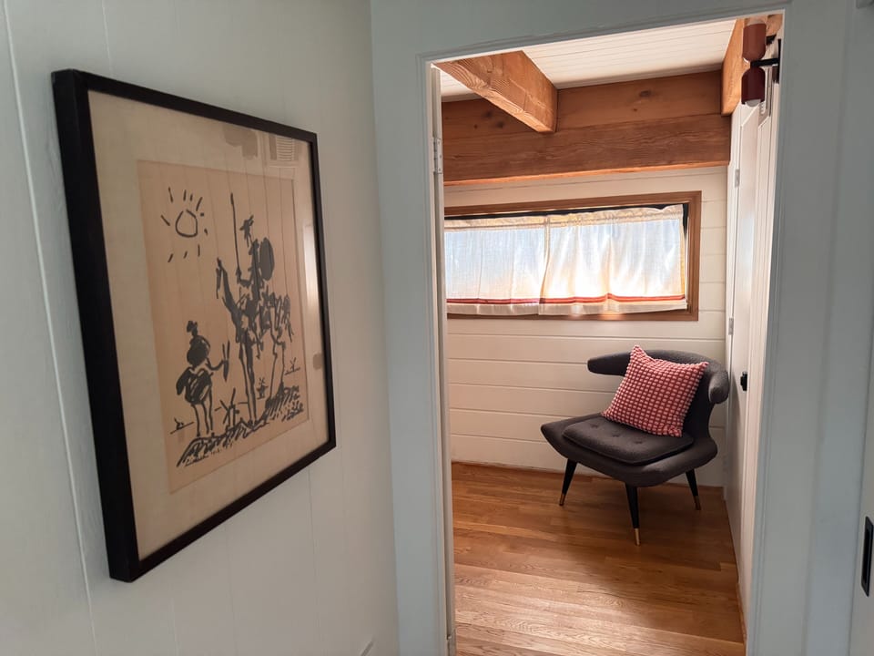 Mid Century art to enhance the experience.