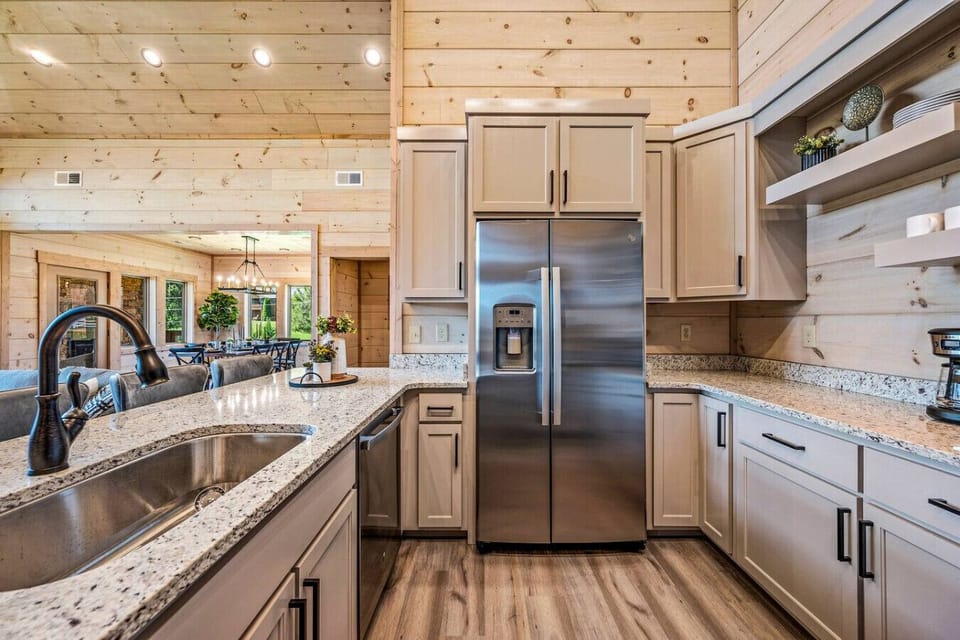 The kitchen includes cookware, dishes, plates, bowls, coffee mugs, wine glasses, silverware and more. There is a standard coffee pot onsite.