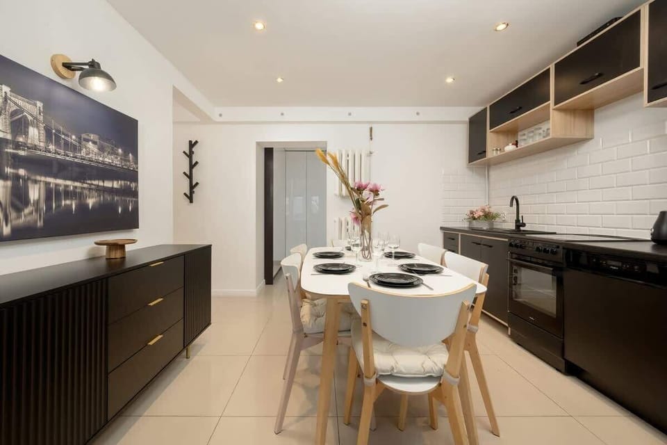 Kitchen area with dining table.
