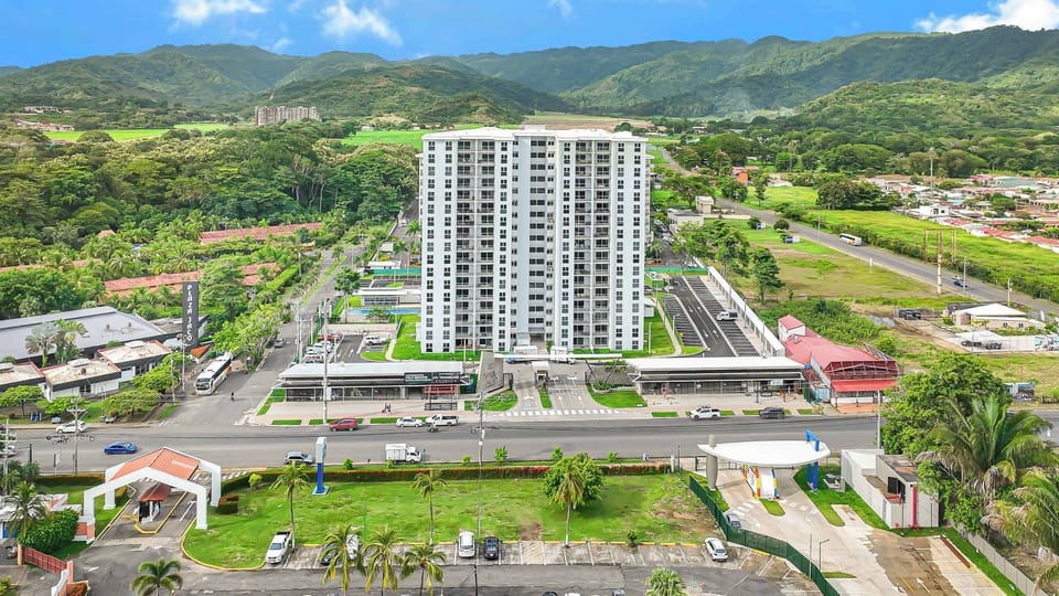 You'll be steps from the beach with a mountain backdrop.