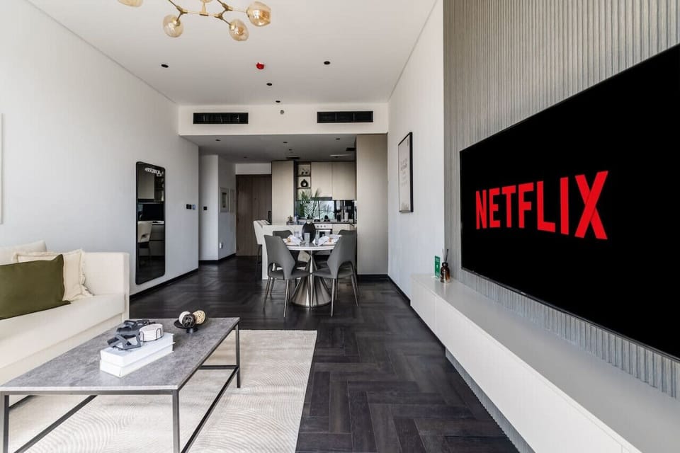 Another angle of the living area with the full length mirror for fit check and the Television set for relaxation