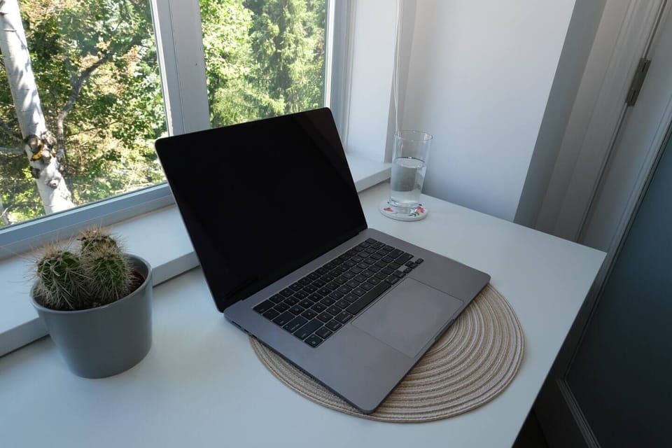 Workspace - This is 15 inch Macbook Air on the folding desk. We've had a portable monitor next the Macbook and there is plenty of room for a mouse and keyboard.