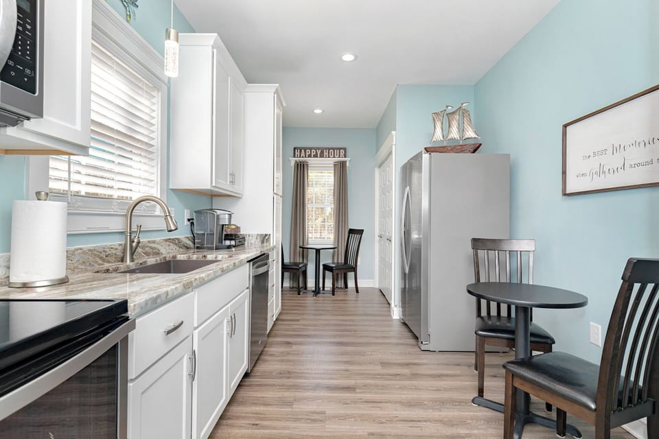 kitchen with 2 tables and 4 chairs
