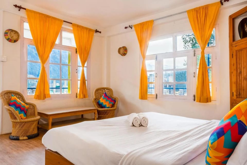 Deluxe Suite, Balcony, Mountain View | Laptop workspace, free WiFi