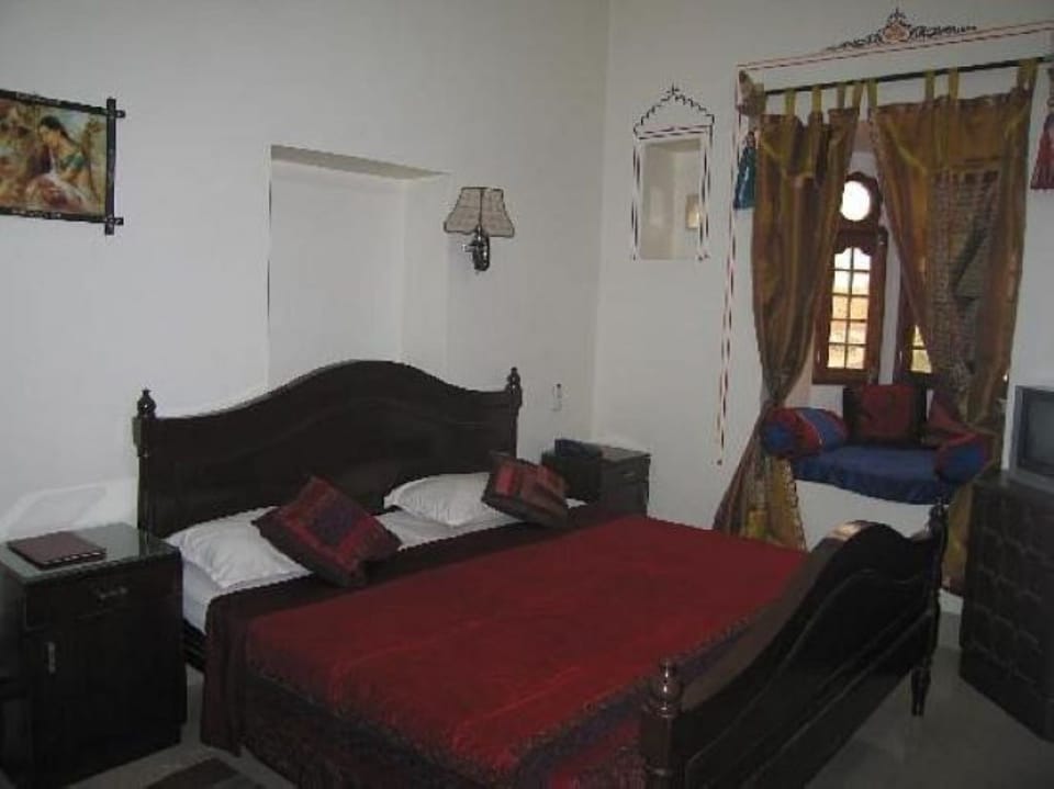 Deluxe Double Room, Balcony, City View | In-room safe, desk, free WiFi