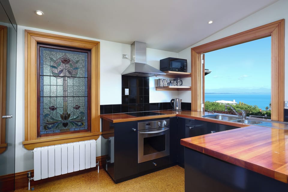 Your private kitchen and laundry with washer and dryer 