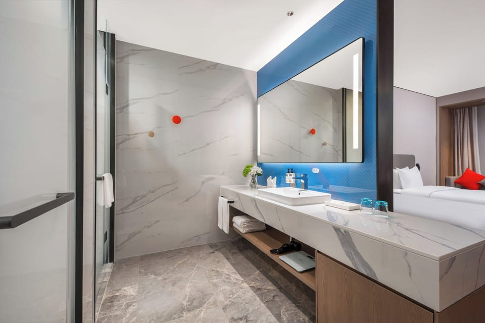 Shower, free toiletries, hair dryer, slippers