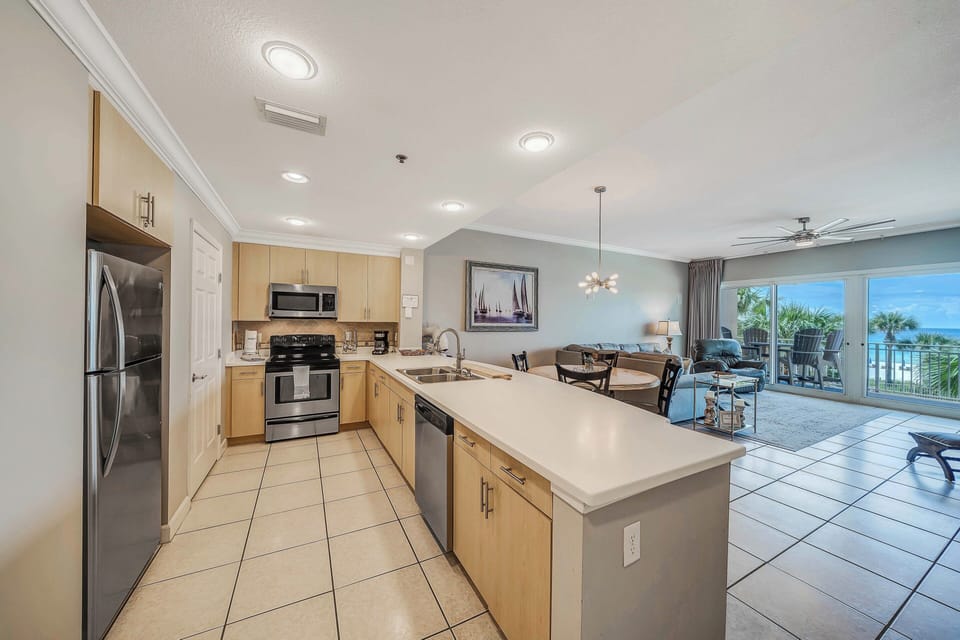 The fully equipped kitchen features stainless-steel appliances, pantry, and has everything you need to prepare meals for family and friends.