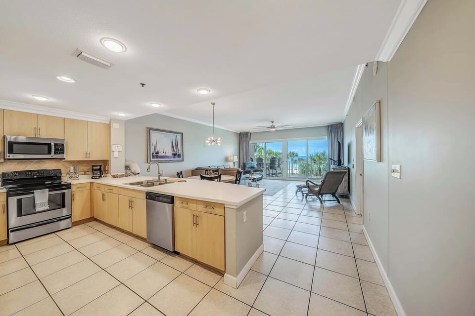 The fully equipped kitchen features stainless-steel appliances, pantry, and has everything you need to prepare meals for family and friends.