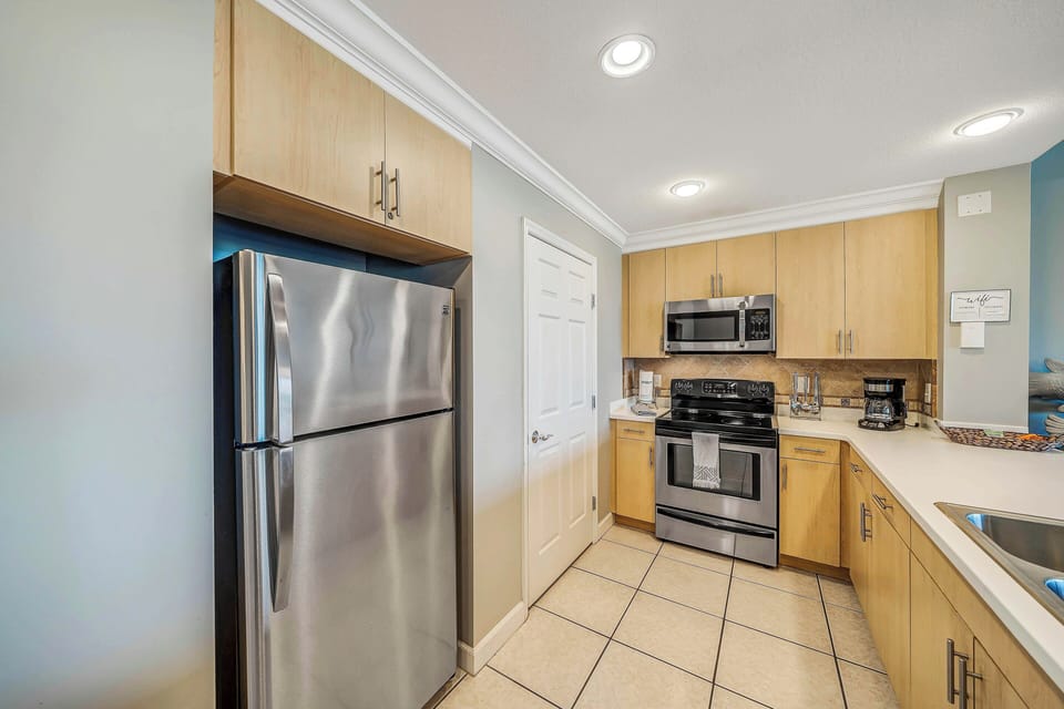 The fully equipped kitchen features stainless-steel appliances, pantry, and has everything you need to prepare meals for family and friends.