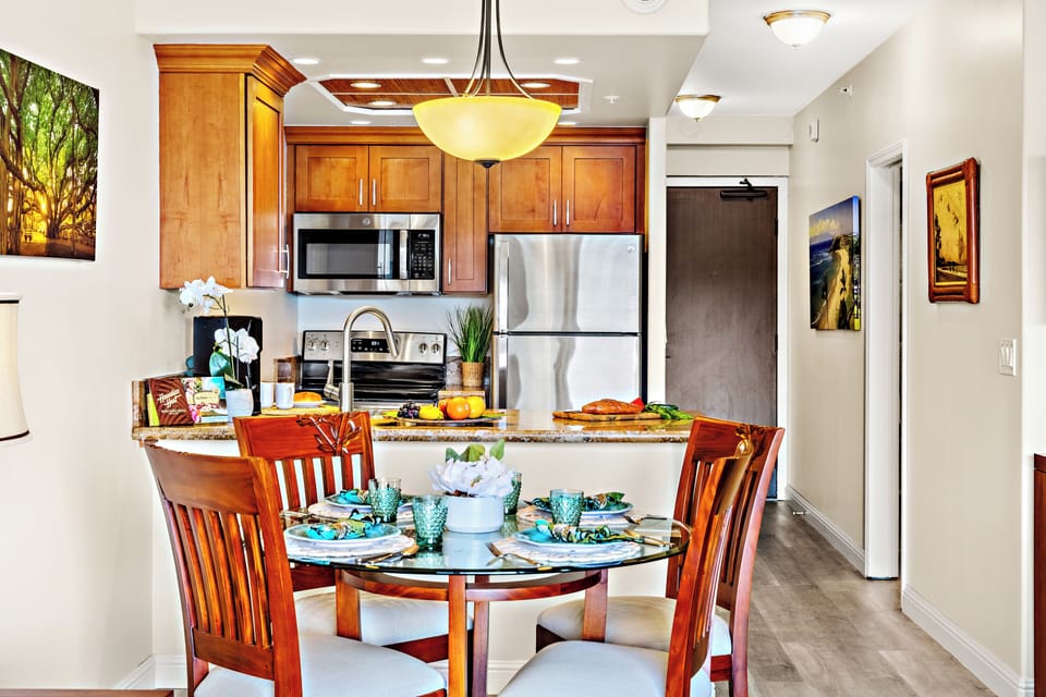 Fully equipped kitchen with a generous breakfast bar, comfortable seating, and modern appliances. Ideal for casual dining or enjoying your morning coffee before a day in paradise.