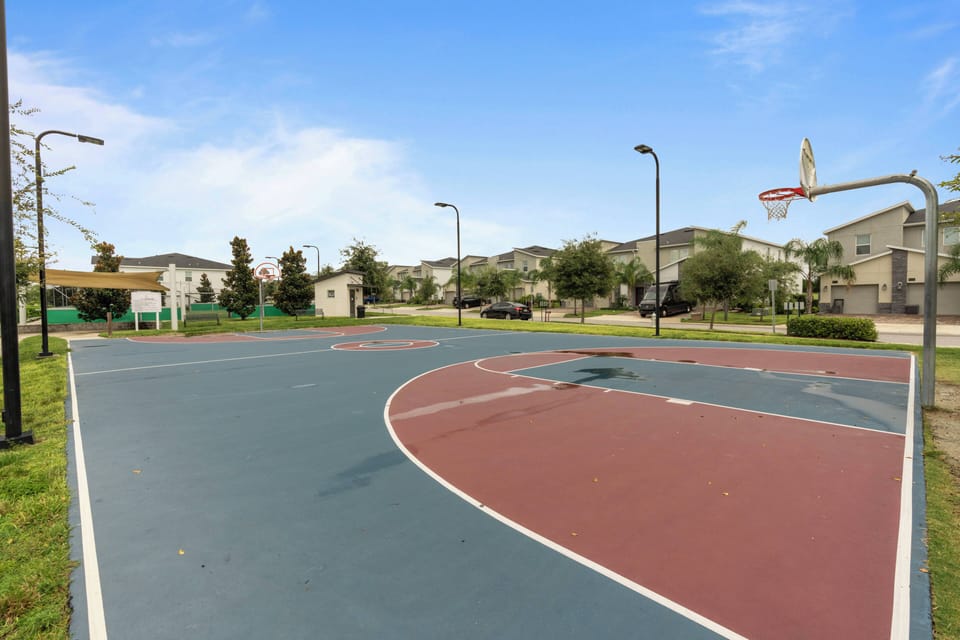Join in on some friendly competition at our vibrant basketball court, where rich colors pop against the blue sky. With plenty of space and great lighting, it’s the ideal place for our active guests to relax and have fun.