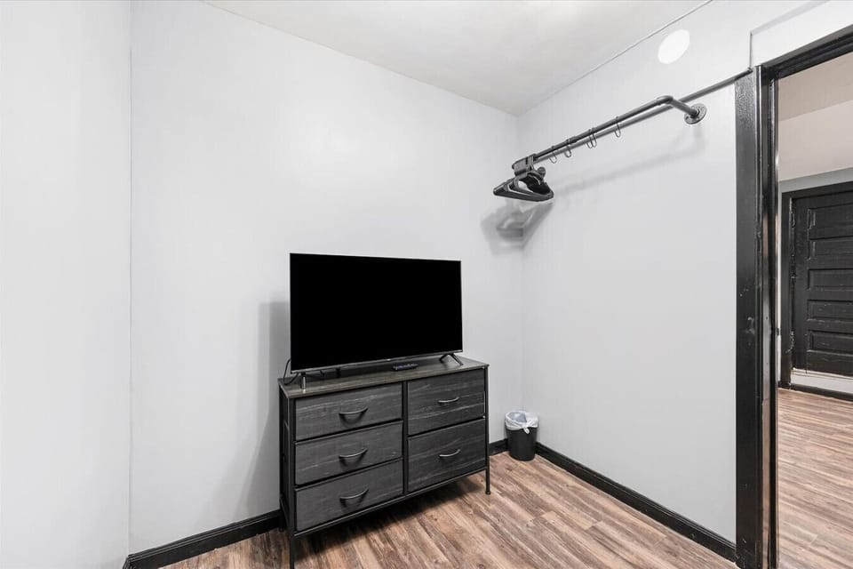 40 inch TV, dresser drawer, clothes rack