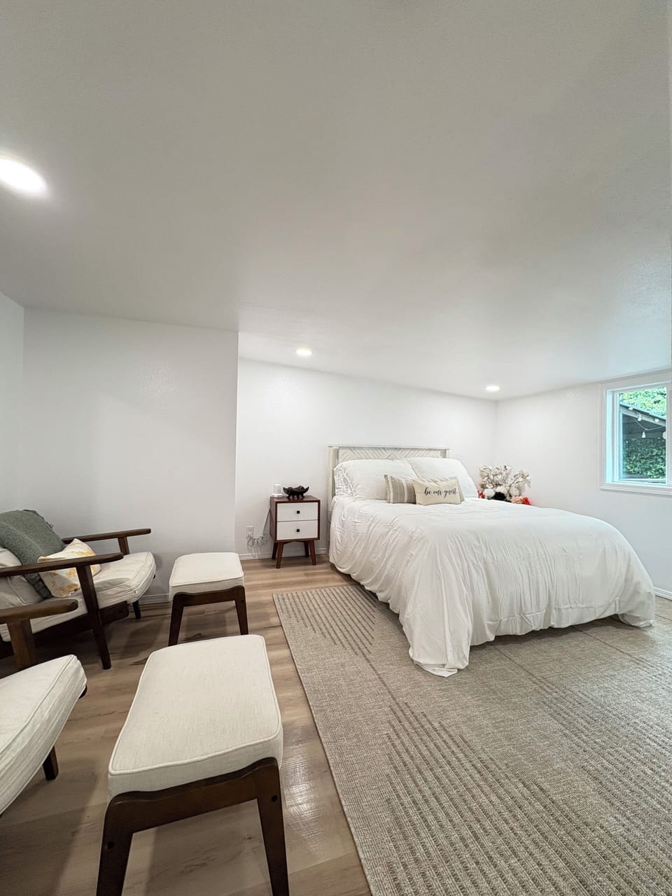 Secondary master suite with a queen and private ensuite