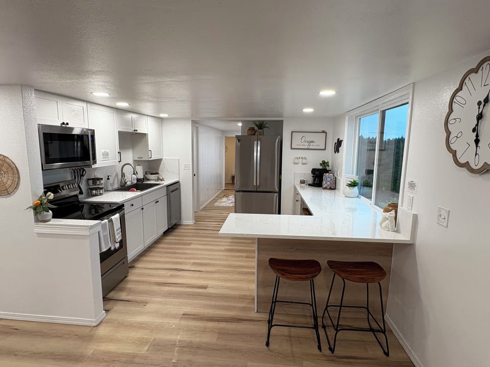 High end appliances & open concept kitchen makes this space feel like home