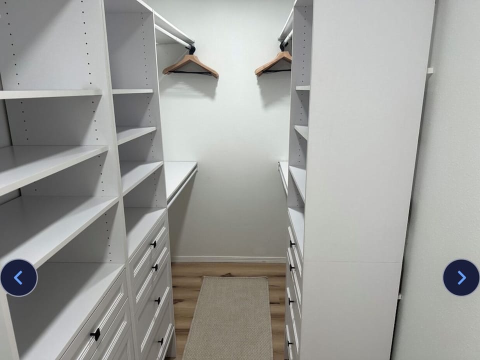 Large walk-in closet is attached to the King Bed fireplace suite & hall bathroom
