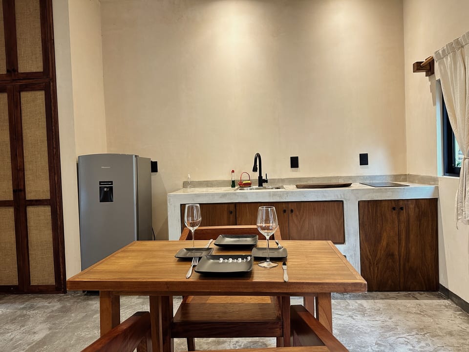 Dining Area Near the Kitchen Space to enjoy meals conveniently next to the kitchen.