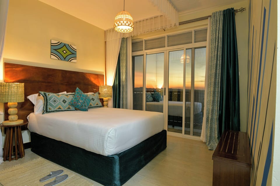 Premium bedding, memory foam beds, laptop workspace, soundproofing