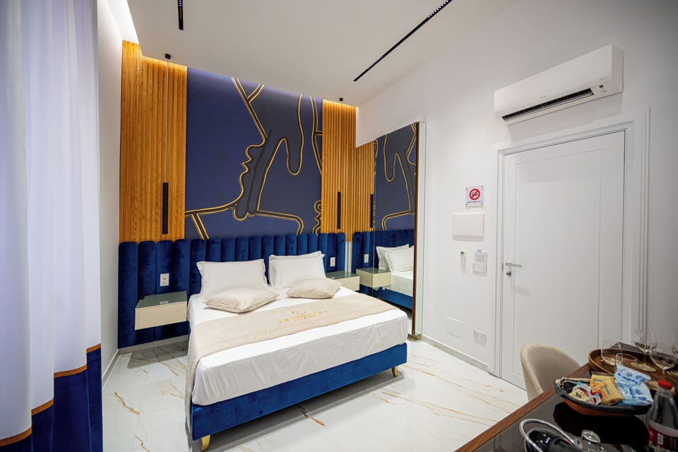 Deluxe Room, 1 King Bed, City View | In-room safe, desk, laptop workspace, soundproofing