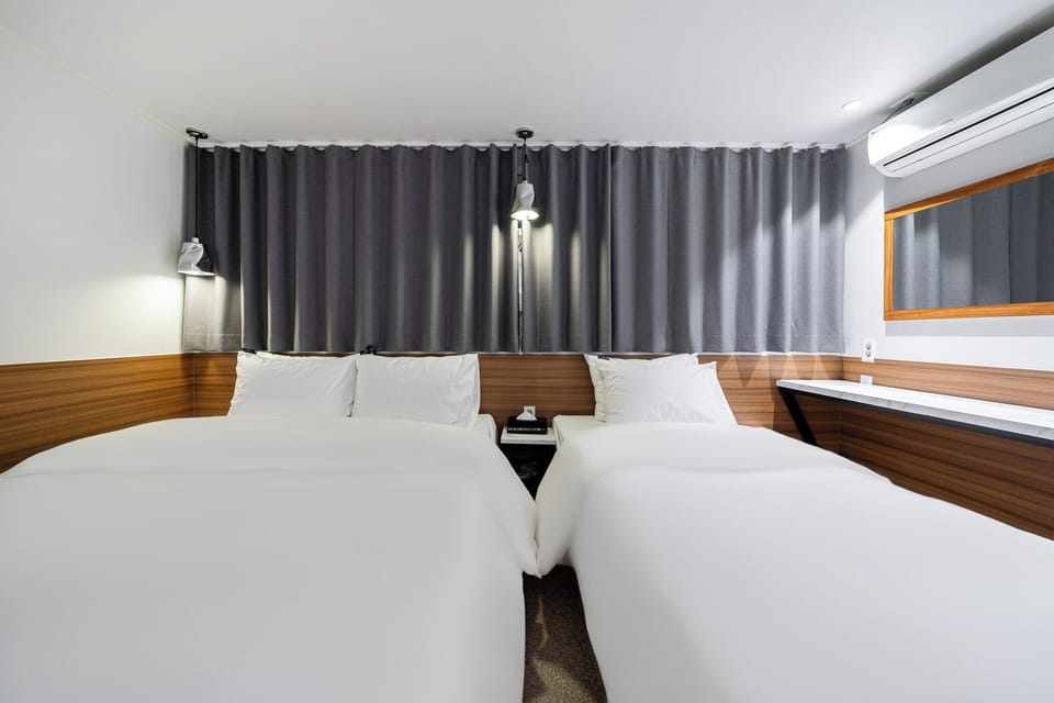 Premium Twin Room | Down comforters, desk, laptop workspace, free WiFi