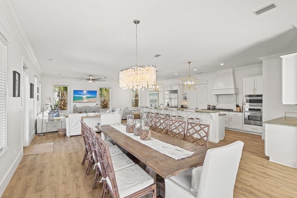 Your spacious open-concept living flows seamlessly from cozy seating to elegant dining, perfect for gathering with loved ones.