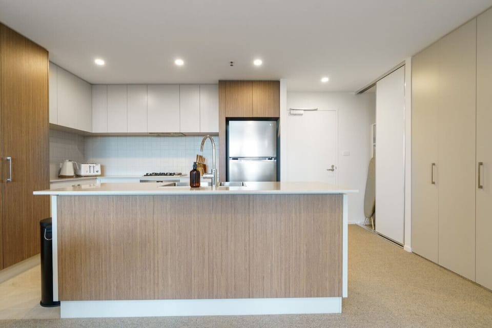 Cook up a storm in our modern kitchen, equipped with sleek appliances and everything you need for a hassle-free meal. It’s designed for both convenience and style.