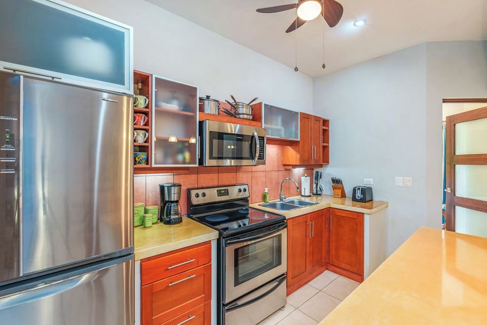 Spacious kitchen with kitchen island.