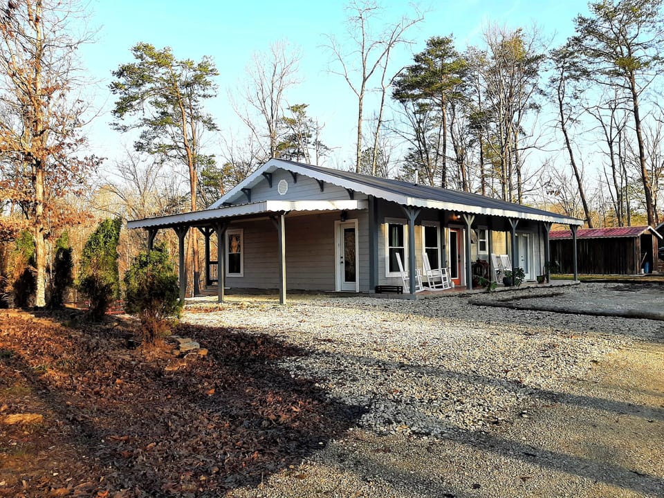 Dappled Grey with a front porch AND a large back deck.