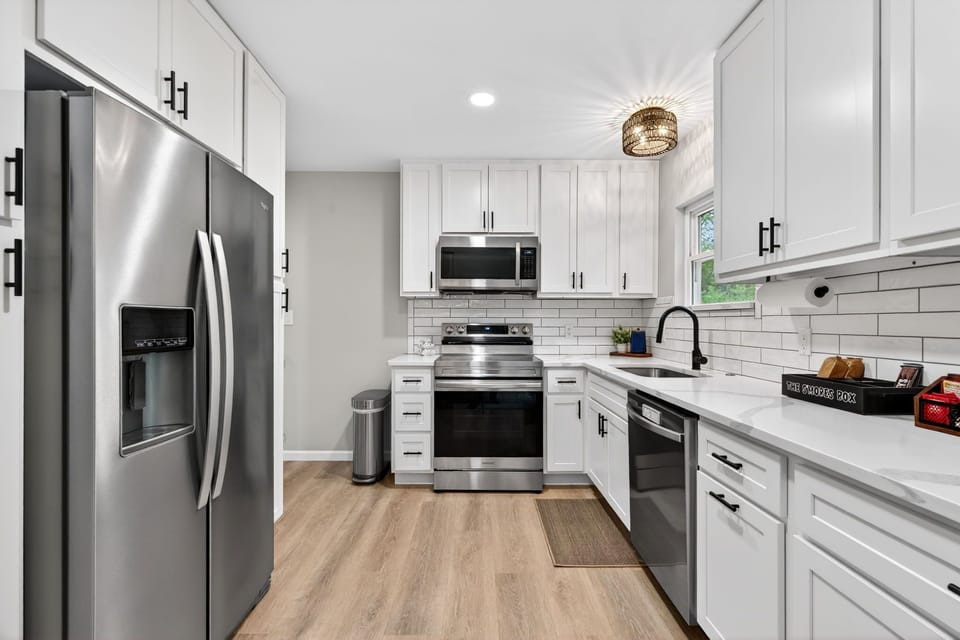 Fully stocked kitchen for real meals with space to gather.