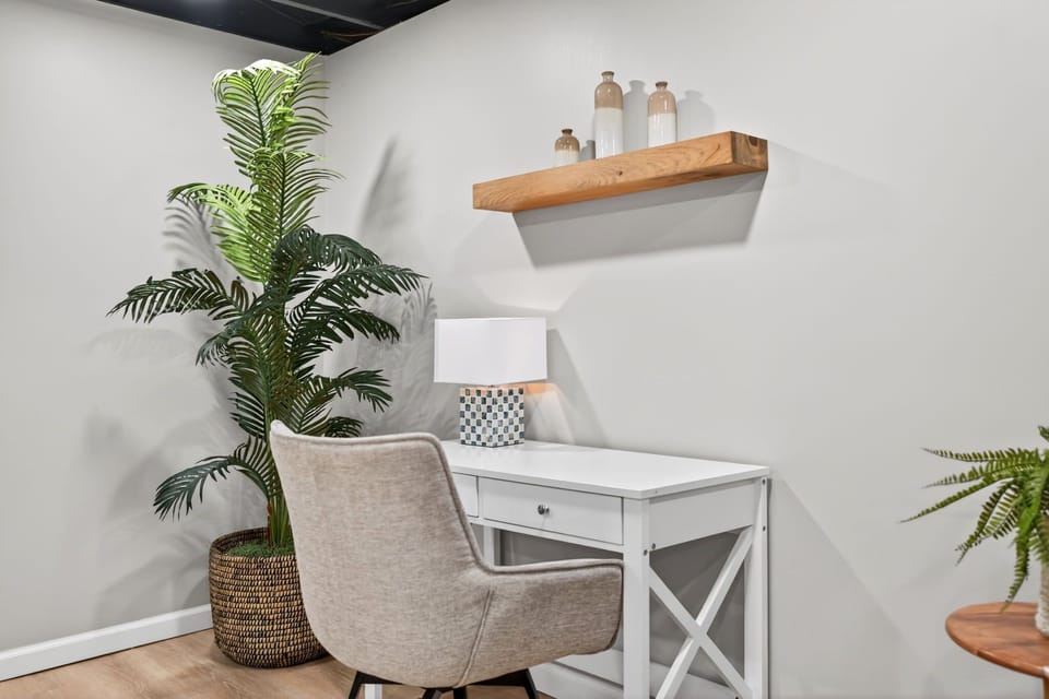 Simple desk workspace, useful for check-ins or trip planning.