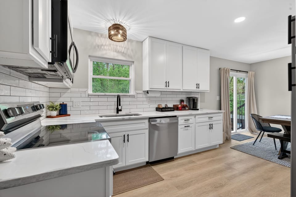 A wider look at the kitchen with the coffee station within easy reach. 