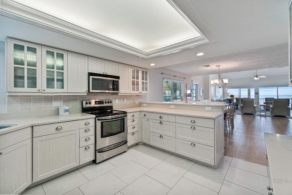 Fully stocked Kitchen with bar seating and ocean view