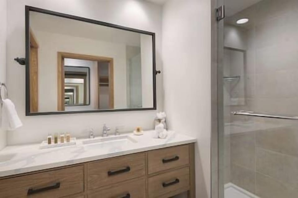 Enjoy a spa-like rinse in the bright, modern shower.