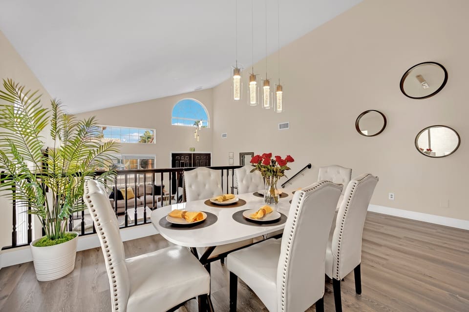 The dining room comfortably seats 8 people, making it perfect for large meals.