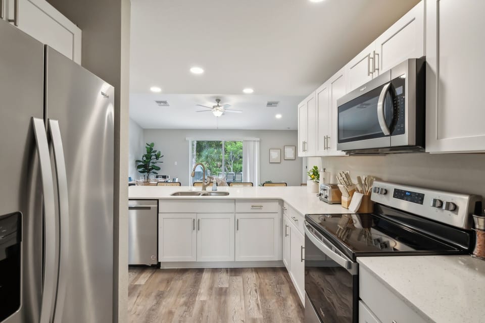 Eat well in the fully stocked kitchen with stainless steel appliances