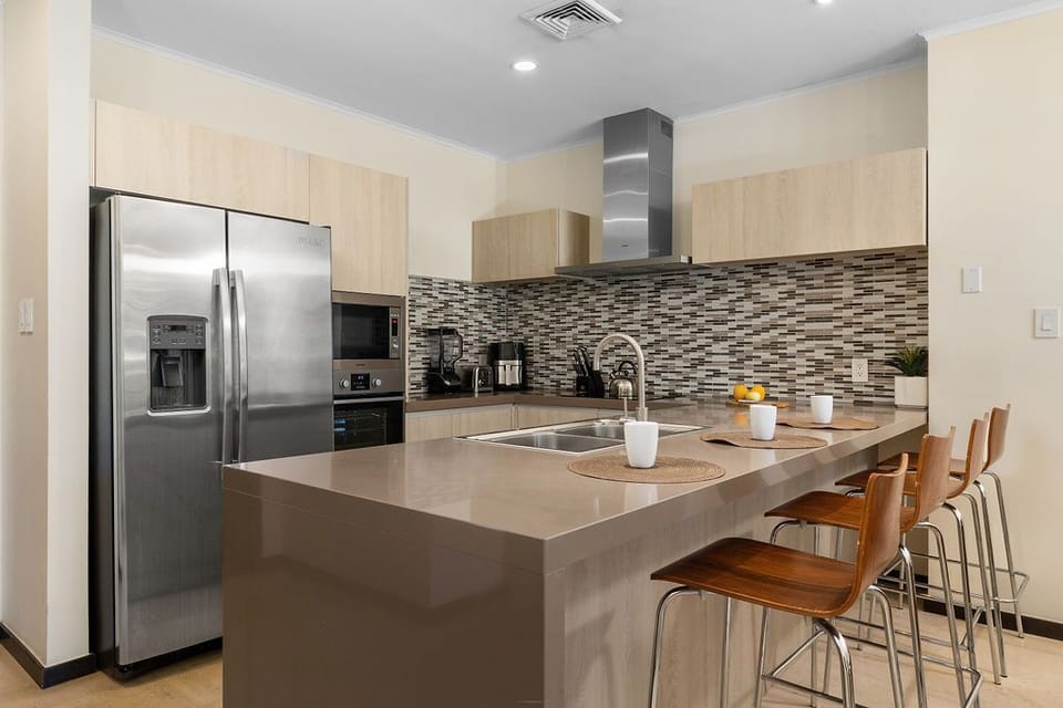 With plenty of space and all the necessary cookware, this kitchen provides the perfect setting for any culinary adventure, ensuring a convenient and enjoyable cooking experience.
