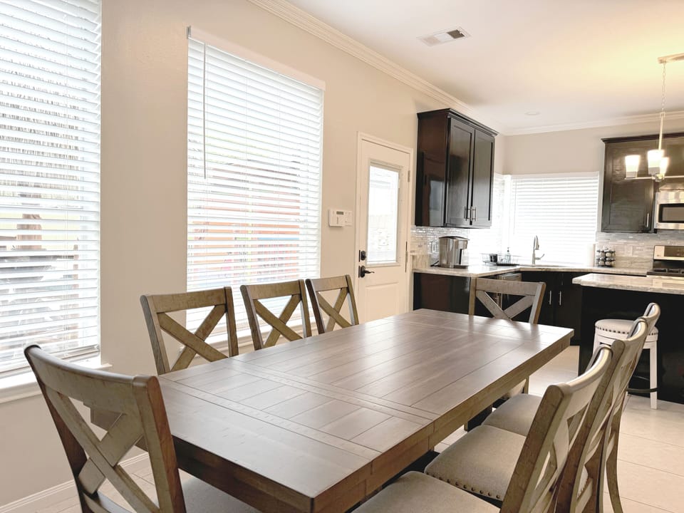 Large dining table for 8 people + 2 extra counter seating spaces