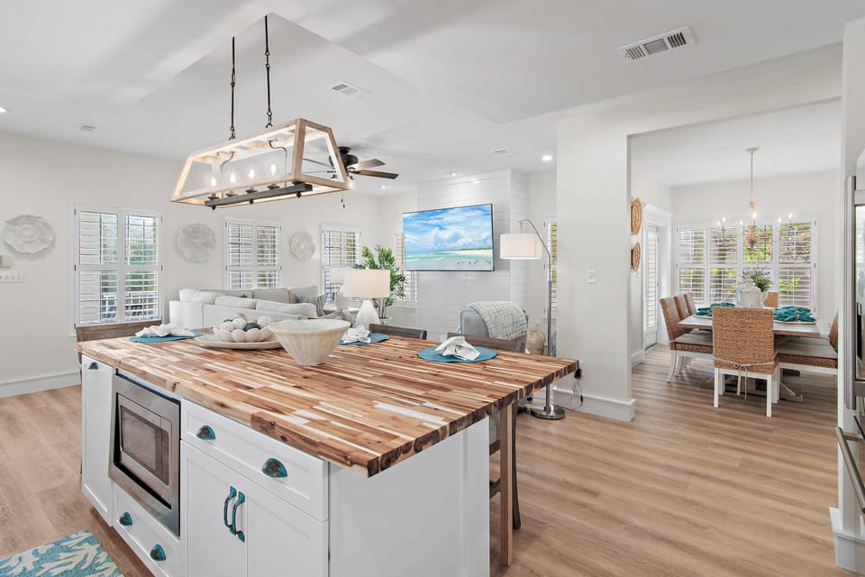 Amazing Renovations with the Warmth of Natural Sunlight throughout the new Kitchen overlooking Living Room & Dining Room