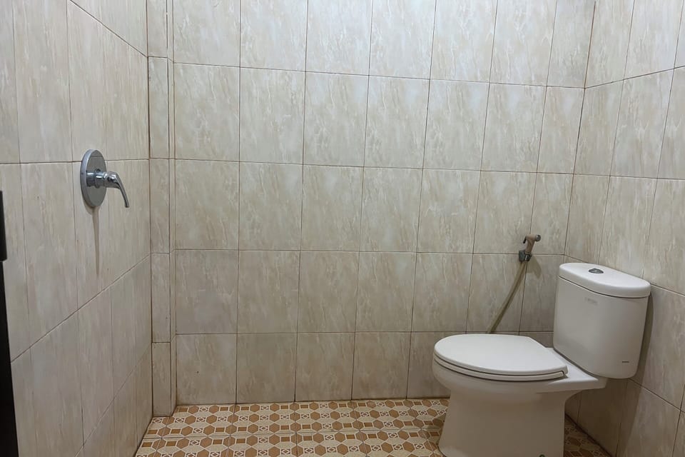 Standard Double Room | Bathroom | Shower, towels, soap