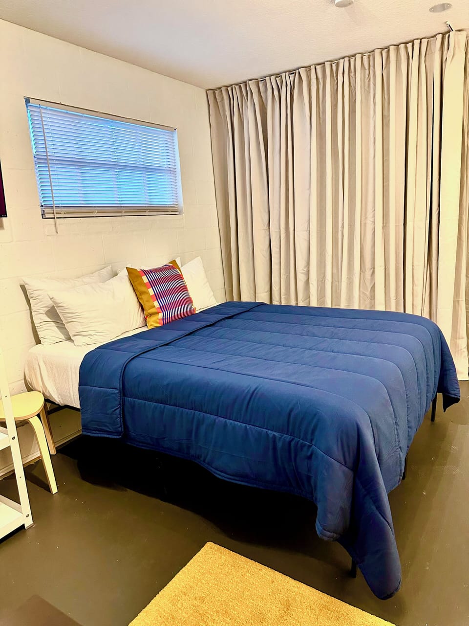 Comfy queen bed for work or rest. Freshly washed linens every stay.