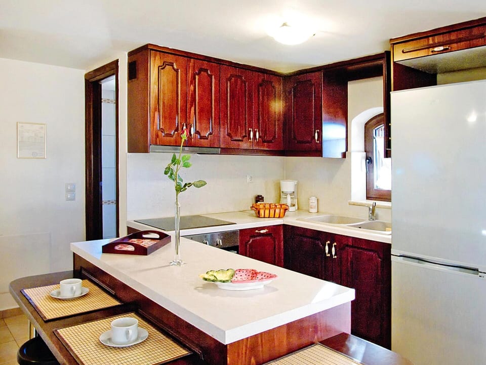 Villa | Private kitchen | Fridge, microwave, oven, coffee/tea maker