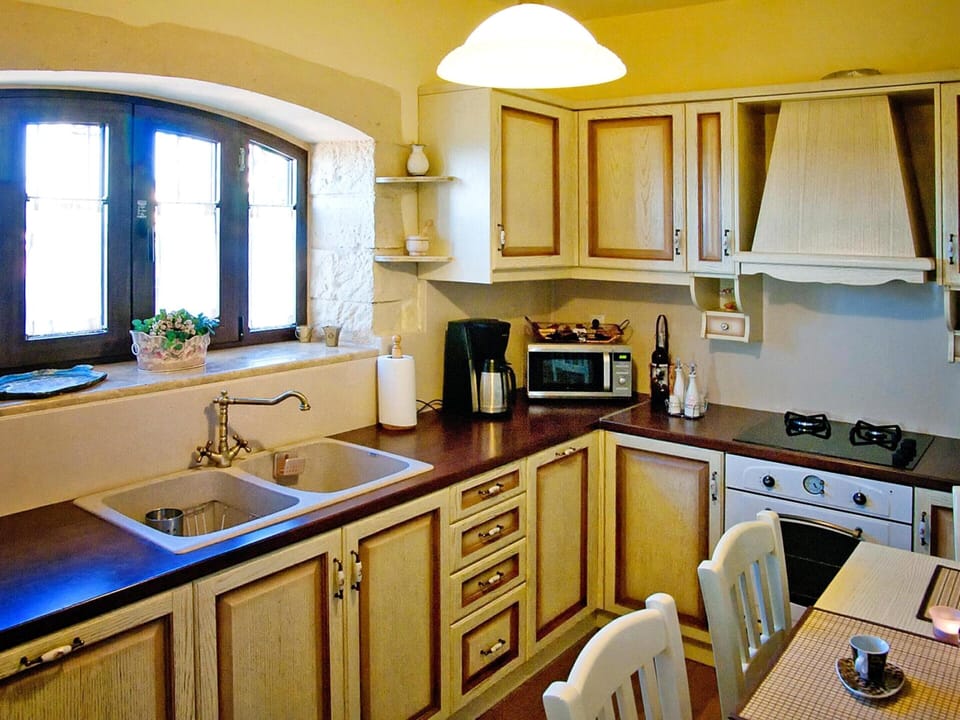 Villa | Private kitchen | Fridge, microwave, oven, coffee/tea maker